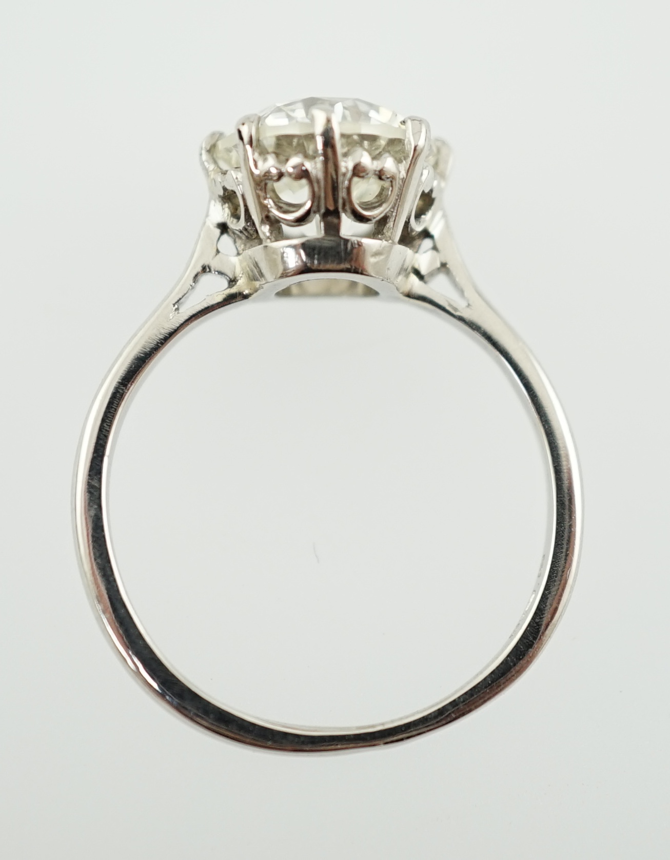 A platinum and solitaire diamond set ring